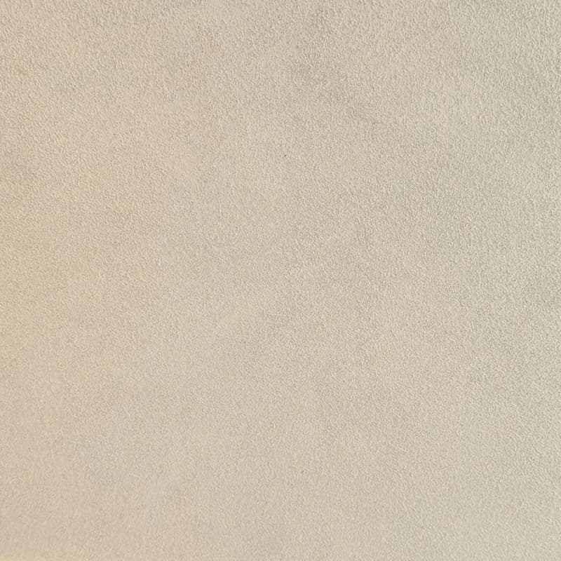 Een woonkamer met een lavavloer gietvloer.