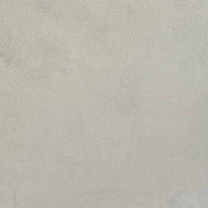 Een woonkamer met een lavavloer gietvloer.