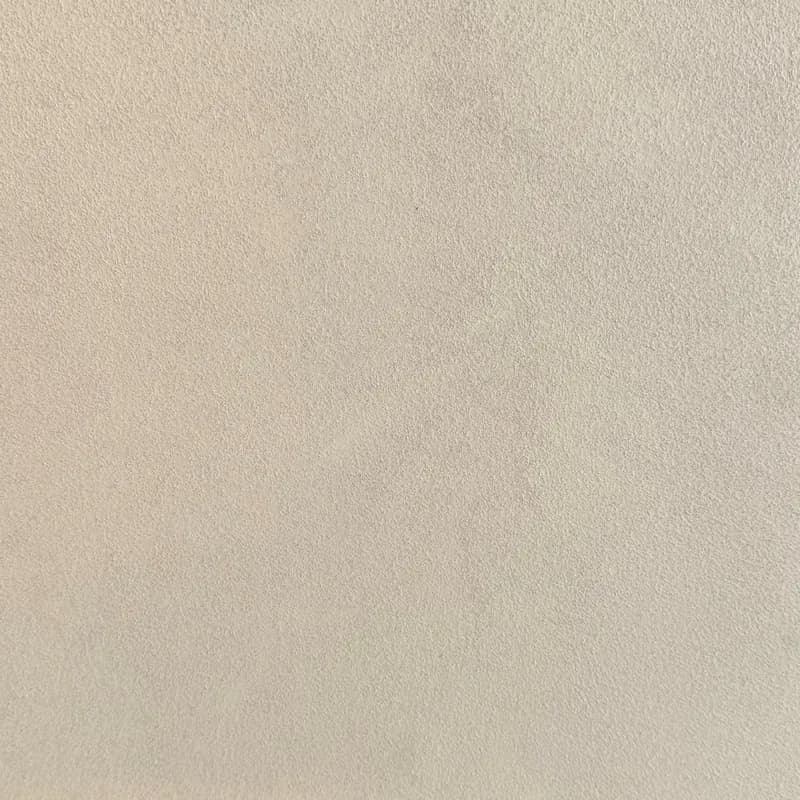 Een woonkamer met een lavavloer gietvloer.