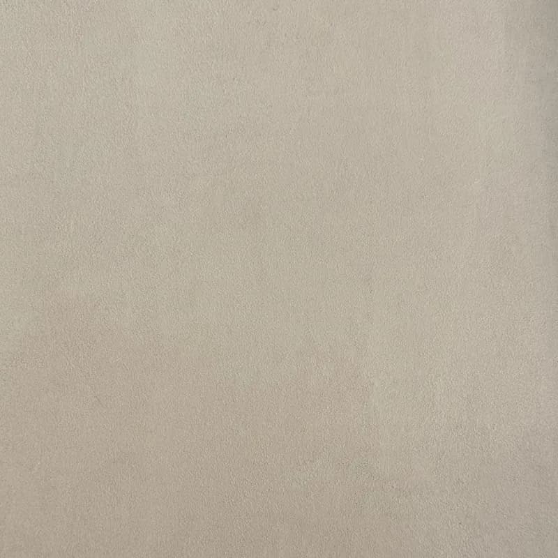 Een woonkamer met een lavavloer gietvloer.