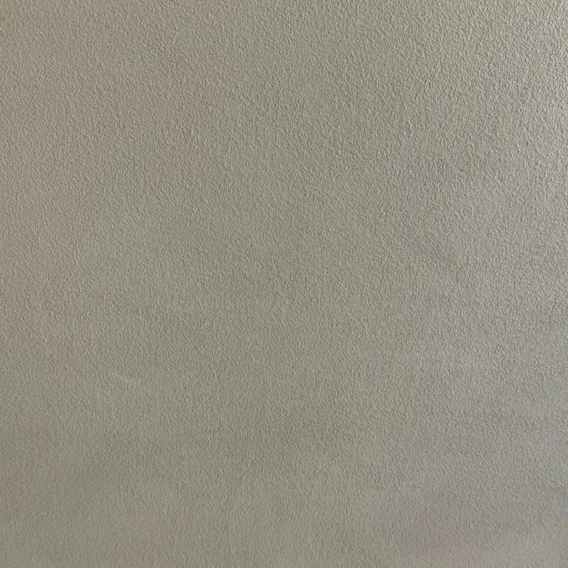 Een woonkamer met een lavavloer gietvloer.