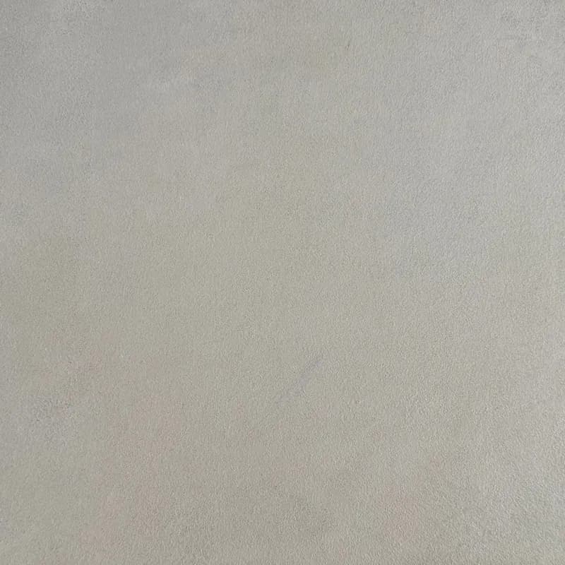 Een woonkamer met een lavavloer gietvloer.